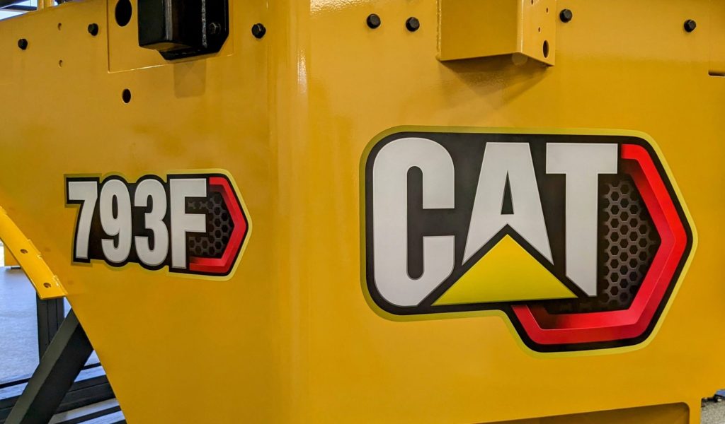 Printed label on a yellow CAT corner module